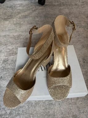 Beautiful gold glitter sandals with ankle strap; never worn